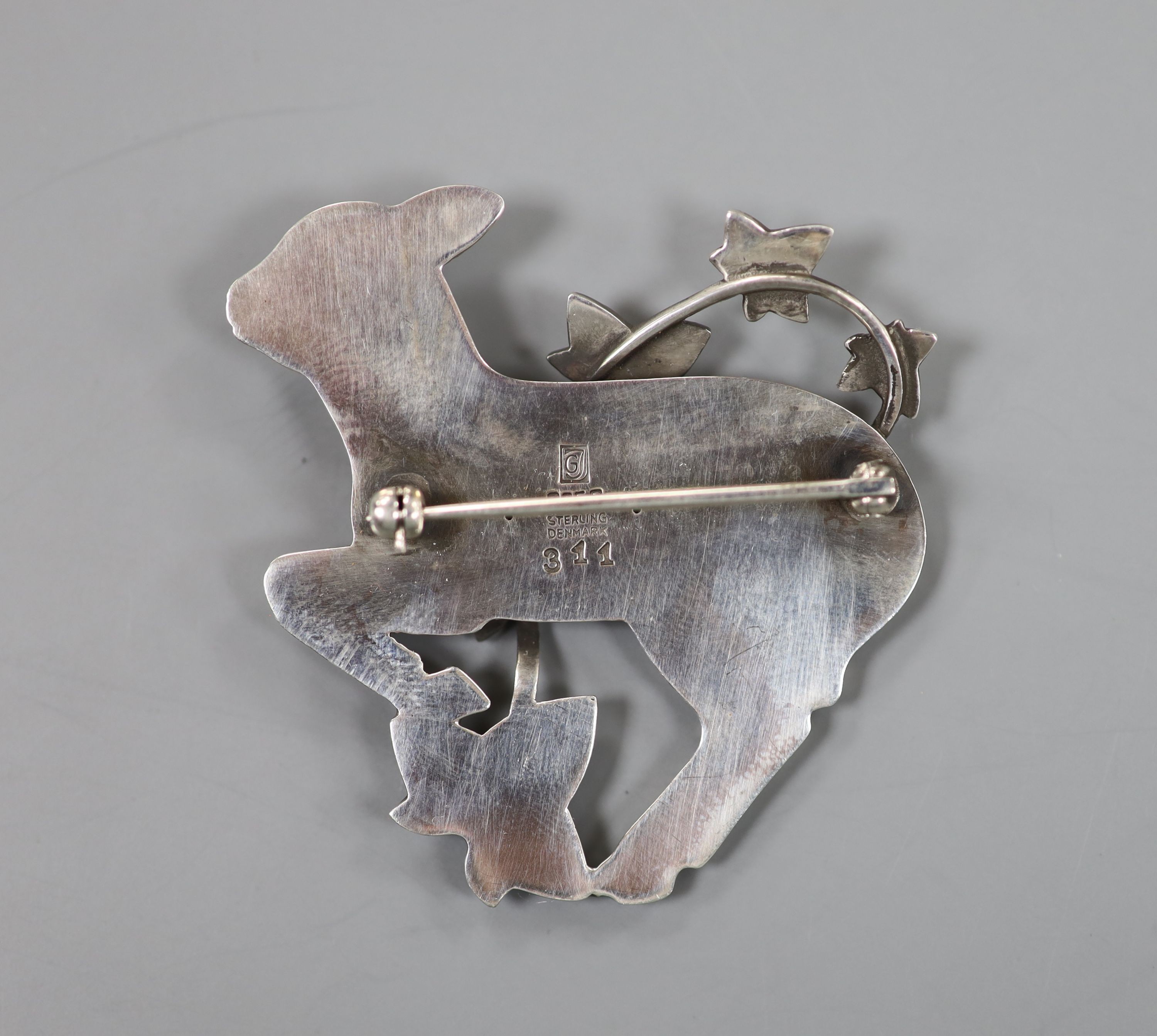 A Georg Jensen sterling lamb and frond brooch, no. 311, 47mm.